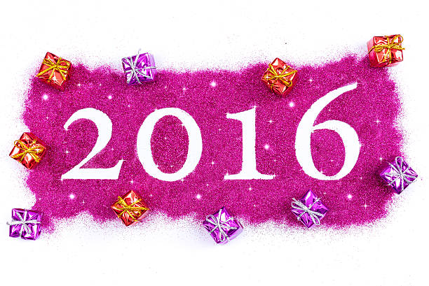 Happy new year 2016 Happy new year 2016 written with pink glitters, isolated on white happy new year card 2016 stock pictures, royalty-free photos & images