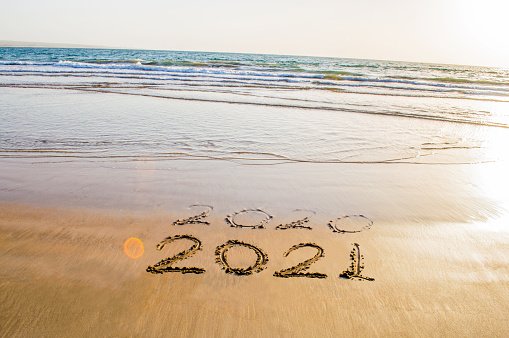 Happy New Year 2021 Text On The Sea Beach Stock Photo 