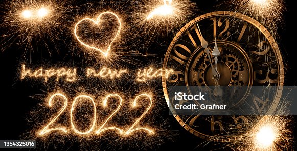 istock happy new year 2022 greeting with clock ticking. golden bright modern sparkler number and letter isolated  black. silvester eve celebration background 1354325016