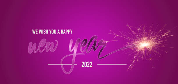 Happy New Year 2022! pink background stock photo
