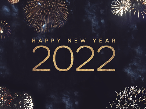 Happy New Year 2022 Text Holiday Celebration Graphic with Gold Fireworks Background in Night Sky