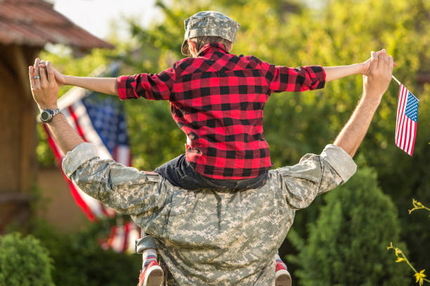 Happy reunion of soldier with family Happy reunion of soldier with family. Happy american family concept military lifestyle stock pictures, royalty-free photos & images