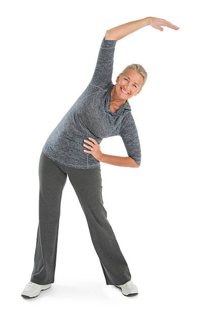 Happy Senior Woman Exercising stock photo