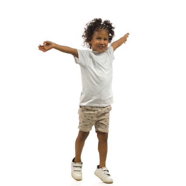 Stand On Tiptoe Boy Stock Photos, Pictures & Royalty-Free Images - iStock