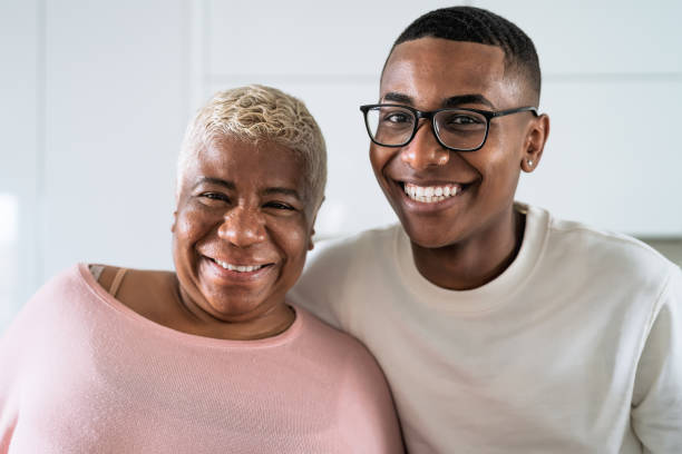 Happy smiling Hispanic mother and son portrait - Family love and unity concept Happy smiling Hispanic mother and son portrait - Family love and unity concept mother and teenage son stock pictures, royalty-free photos & images