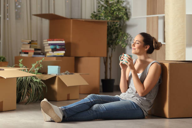 Happy tenant moving home resting breathing fresh air Happy tenant moving home resting breathing fresh air independence stock pictures, royalty-free photos & images