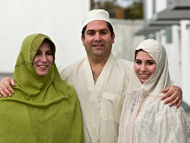 Happy three person Muslim family  tunisia woman stock pictures, royalty-free photos & images