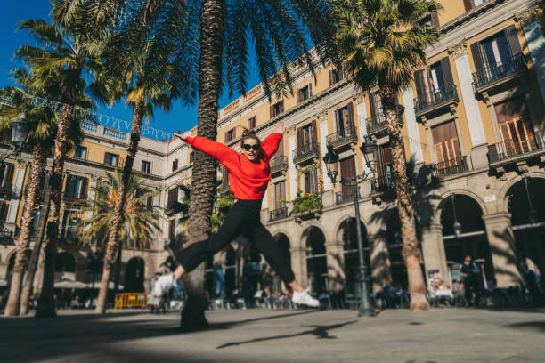 Happy tourist woman in Barcelona stock photo