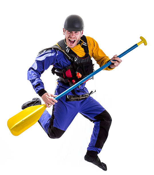 Happy white water rafter jumping stock photo