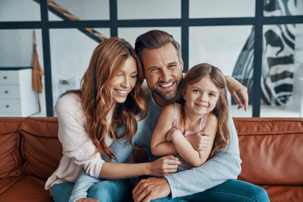 Happy young family stock photo