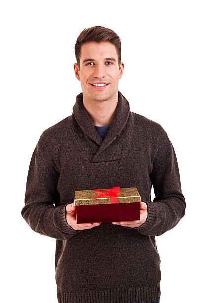 Happy young man carries present stock photo