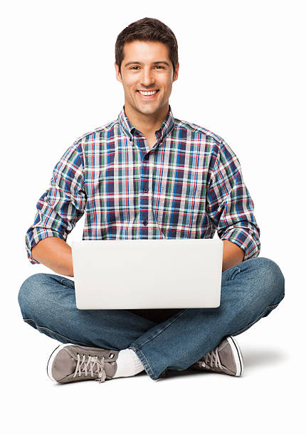 Happy Young Man With a Laptop - Isolated stock photo