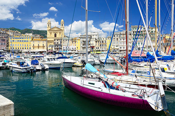 Harbour in Bastia Old port and church of St. John the Baptist in Bastia, Corsica, France bastia stock pictures, royalty-free photos & images