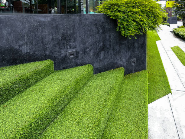 Hardscape of modern building stairway decoration with artificial grass stock photo