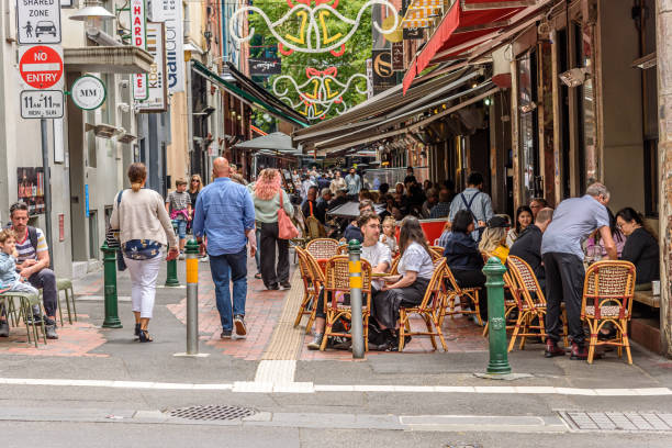 Hardware Lane in Melbourne, Australia is a popular tourist area filled with cafes and restaurants featuring outdoor dining. stock photo