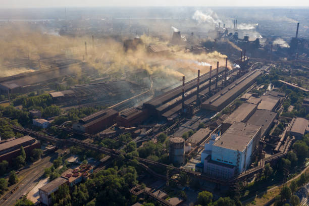 Harmful emissions into the atmosphere from the pipes of the plant in Zaporozhye in Ukraine. Harmful emissions into the atmosphere from the pipes of the plant in Zaporozhye in Ukraine. zaporizhzhia stock pictures, royalty-free photos & images