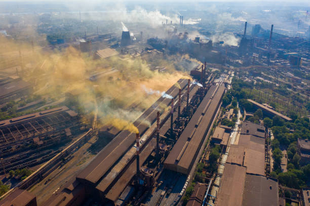 Harmful emissions into the atmosphere from the pipes of the plant in Zaporozhye in Ukraine. Harmful emissions into the atmosphere from the pipes of the plant in Zaporozhye in Ukraine. zaporizhzhia stock pictures, royalty-free photos & images