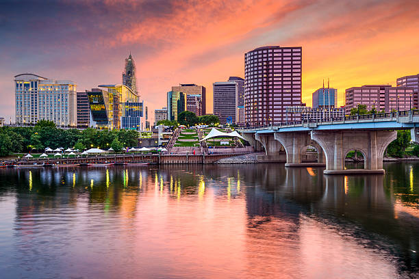 Hartford, Connecticut Skyline Hartford, Connecticut, USA Skyline on the river at sunset. connecticut stock pictures, royalty-free photos & images