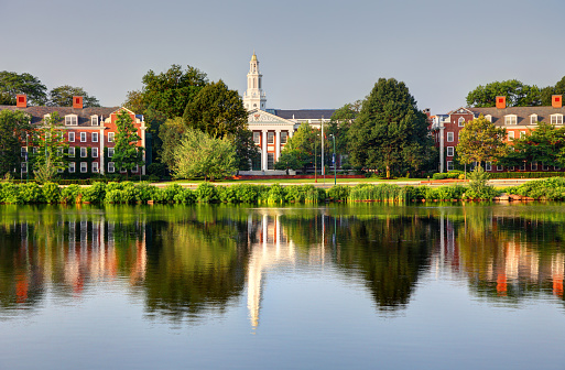 Boston, Massachusetts, USA - July 5, 2015: Harvard University campus reflecting on the Charles River at dawn. 