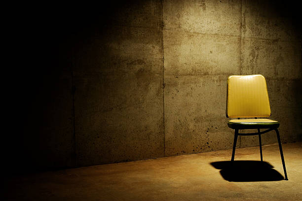 Have a seat--interrogation room stock photo
