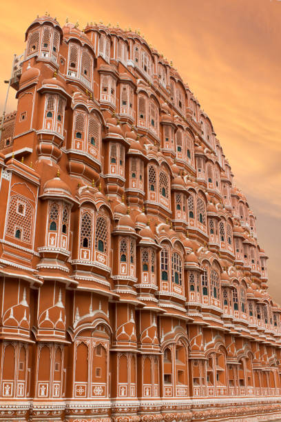 Hawa Mahal (Palace of the Winds) Jaipur, India Hawa Mahal is a palace in Jaipur, India. Build in 1799, it forms part of the City Palace and was the women\'s quarters (harem) designed to provide the residents with discreet views of the street below. hawa mahal stock pictures, royalty-free photos & images