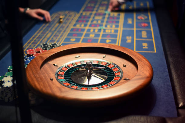 Hazard gambling concept. Roulette playing. Casino players. stock photo