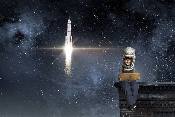 He want to become astronaut . Mixed media stock photo