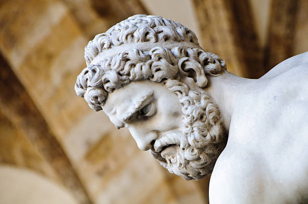 Head detail of stone sculpture of Hercules Detail of the statue "Hercules and the Centaur" by Giambologna  1529-1608, The statue is located   in the gallery of sculptures at the Piazza della Signoira florence italy photos stock pictures, royalty-free photos & images
