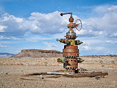 istock head of oil well with numerous valves 1319841670