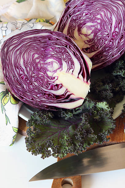 head of purple cabbage on the board.. stock photo