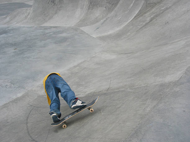 Headless Skateboarder stock photo