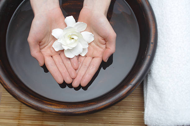 healing therapy with water and flower stock photo