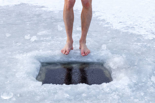 health and cold water hardening. - ice swimming stockfoto's en -beelden