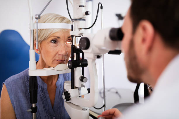 Health care, people, eyesight and technology concept Health care, medicine, people eyesight and technology concept eye doctor stock pictures, royalty-free photos & images