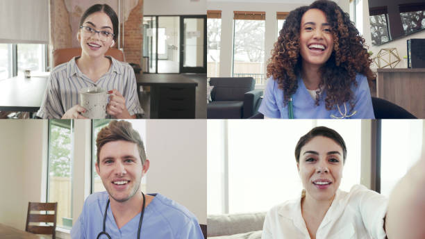 Health professionals use video conference to catch up Four mid adult health professionals use video conference to catch up with each other. nurse talking to camera stock pictures, royalty-free photos & images