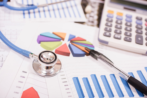 smuggling librarian Specified Healthcare Finances Represented By Doctors Stethoscope Financial Charts  Stock Photo - Download Image Now - iStock