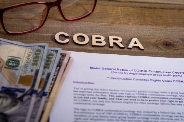 COBRA Healthcare Insurance Benefits for Unemployment concept COBRA Healthcare Insurance Benefits for Unemployment concept on wooden board cobra stock pictures, royalty-free photos & images