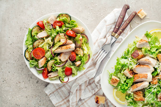 Healthy chicken salads with grilled chicken stock photo
