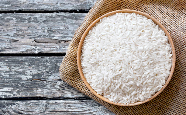 Healthy eating scene with raw, parboiled rice stock photo