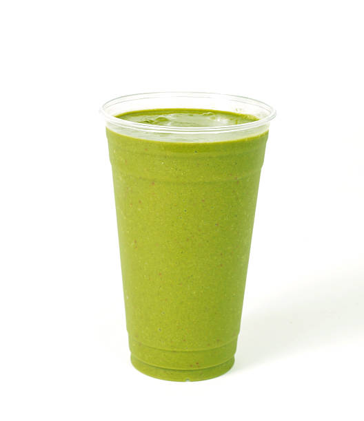 Healthy green vegetable smoothie stock photo