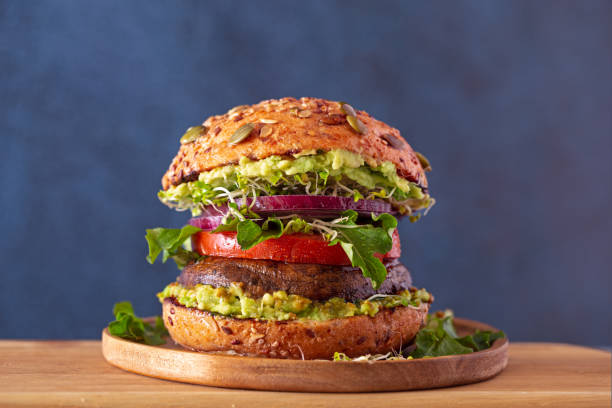 Healthy meat alternative portobello mushroom burger stock photo
