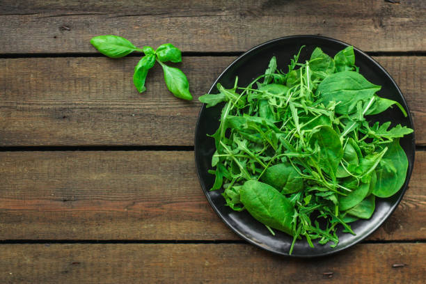 Healthy salad, leaves mix salad (mix micro greens, juicy snack). food background - Image Healthy salad, leaves mix salad (mix micro greens, juicy snack) arugula stock pictures, royalty-free photos & images