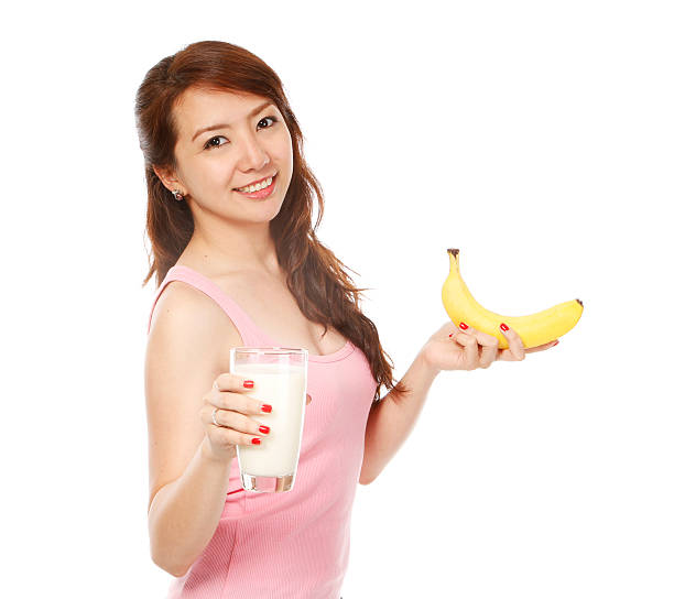 Beautiful Sexy Young Woman Eating Banana Stock Photos, Pictures ...