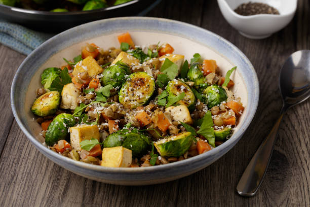 Healthy Vegan green lentils bowl stock photo