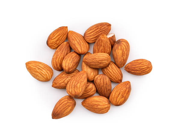 Heap of almonds isolated on white background, top view Heap of almonds isolated on white background, top view almond stock pictures, royalty-free photos & images