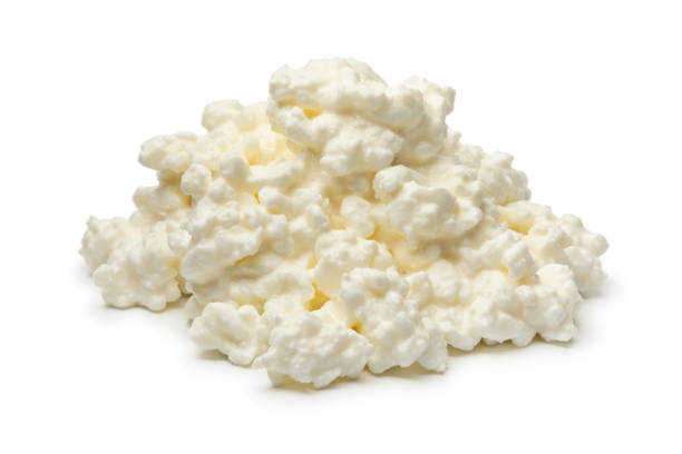 Heap of cottage cheese close up stock photo