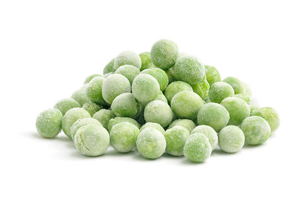 Heap of Frozen Peas stock photo