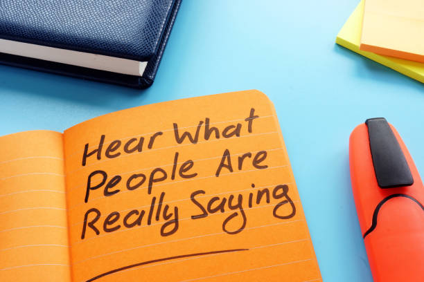 Hear what people are really saying sign. Active listening technique concept. Hear what people are really saying sign. Active listening technique concept. listening stock pictures, royalty-free photos & images