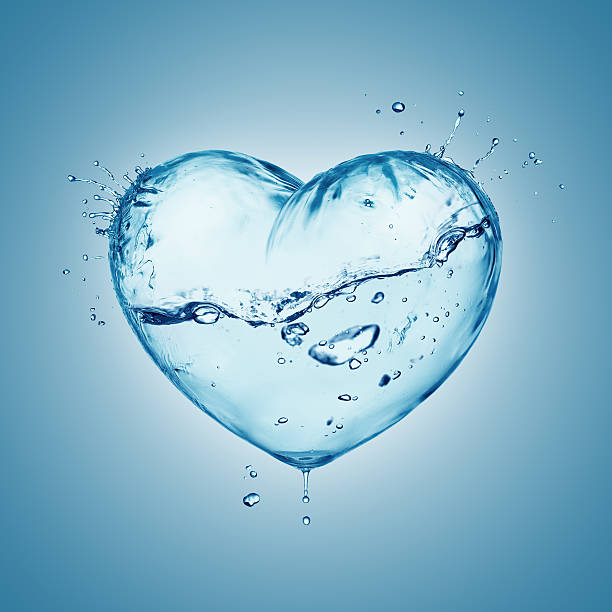 Heart from water splash with wave, inside isolated on white stock photo