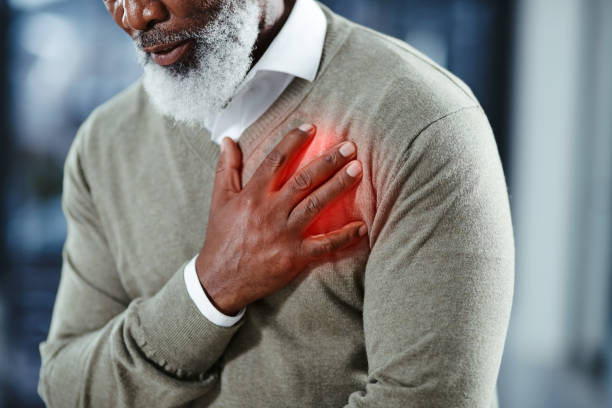 Heart problems can affect anyone at any time Shot of a senior man holding his chest in discomfort chest pain stock pictures, royalty-free photos & images